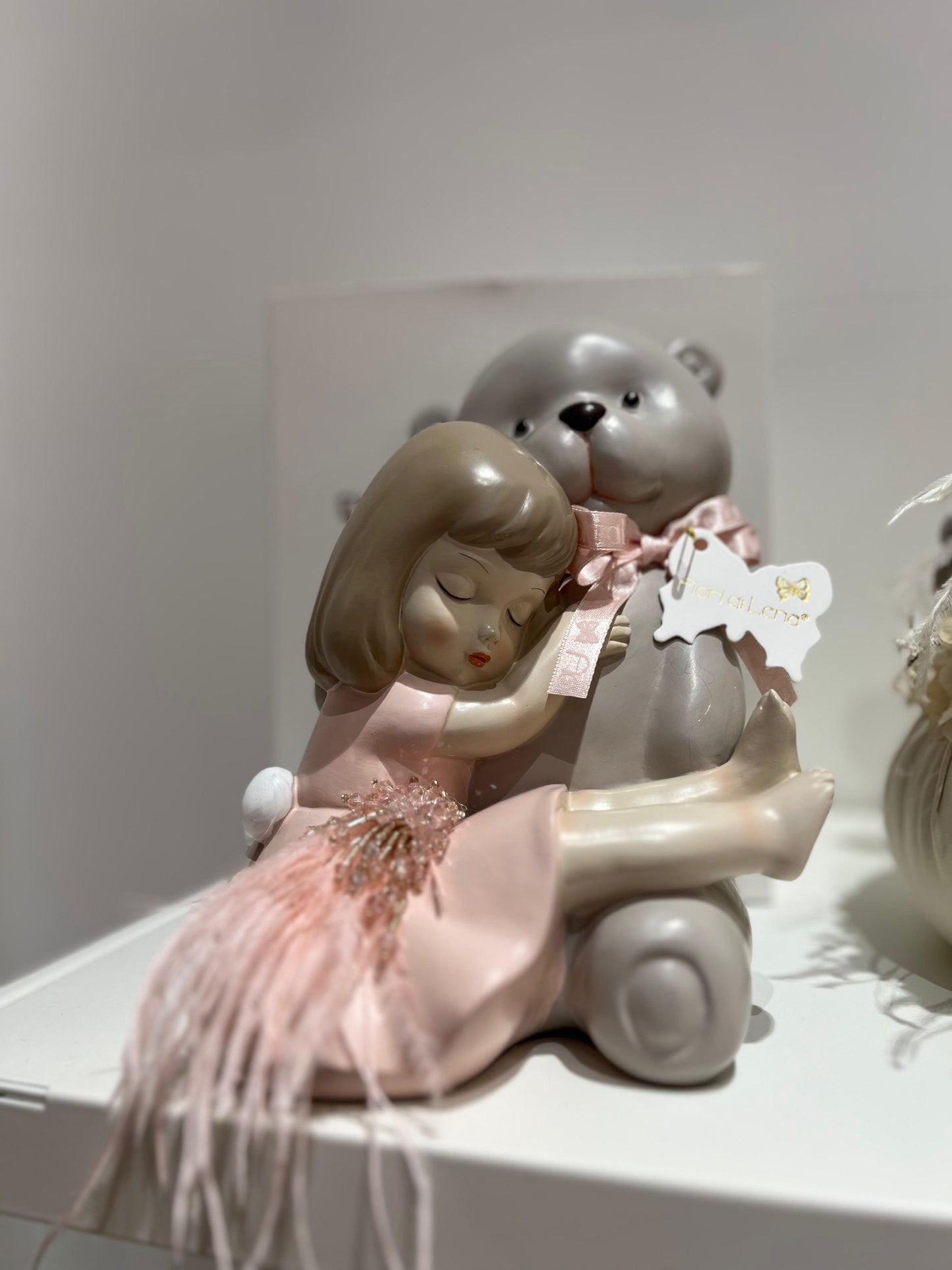 BOMBONIERA BIMBA CON PIUME ROSA