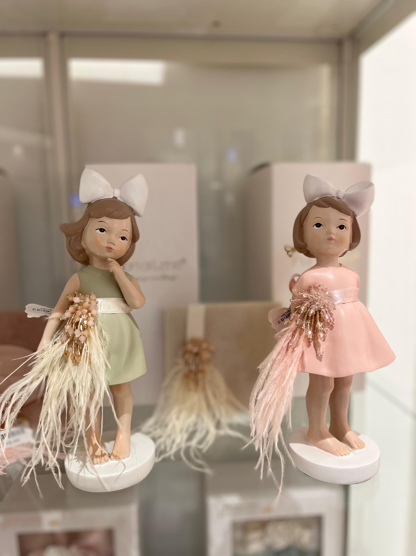 BOMBONIERA BIMBA ROSA CON GIOIELLI E PIUME