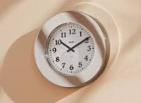 Momento, orologio da parete cromato, Alessi
